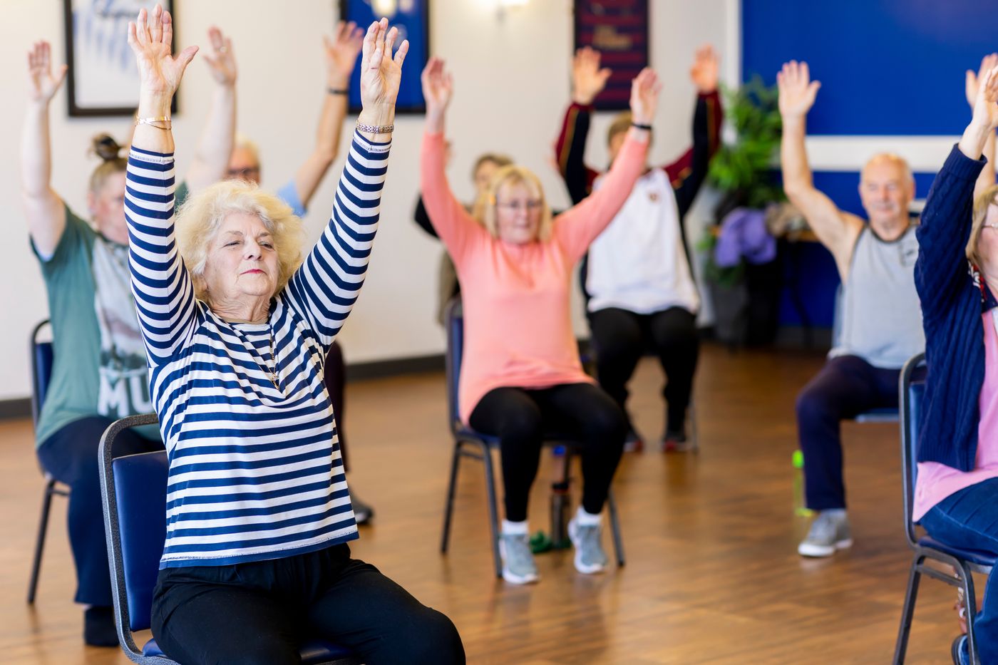 A group of seniors during a chair exercise class